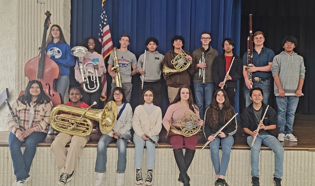 Group picture of band students with their instruments 